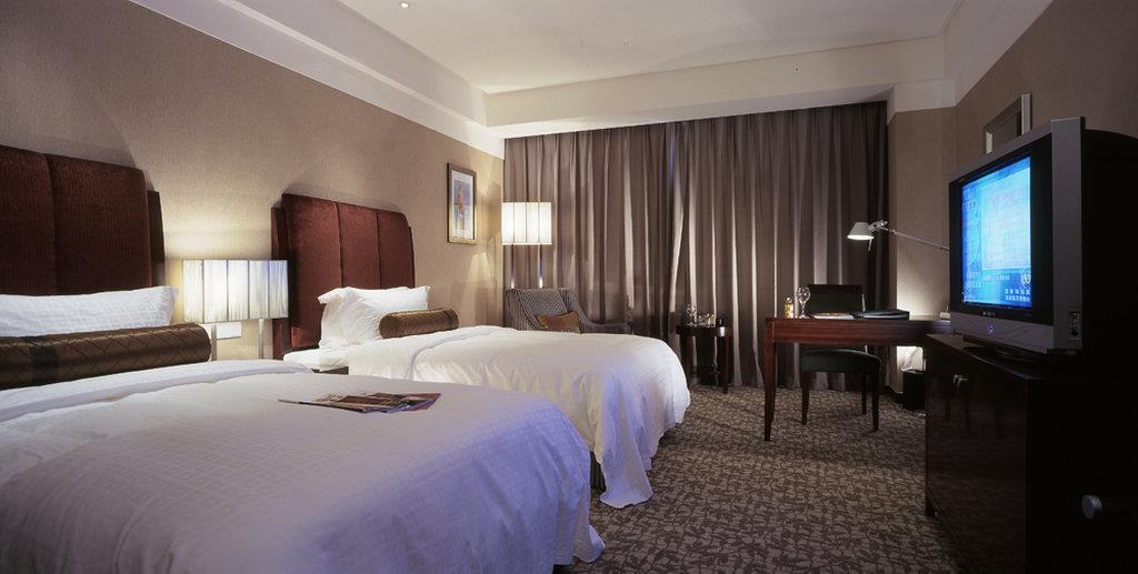 Ruiwan New Century Hotel Tianjin Rum bild